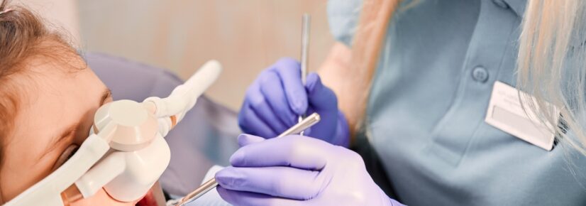 Relaxed patient in the dental chair during treatment — Relax and Smile: The Benefits of Sedation Dentistry